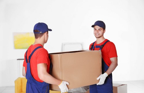 Man and van loading furniture for a move in Hendon