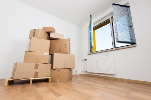Professional movers handling household items in Hendon