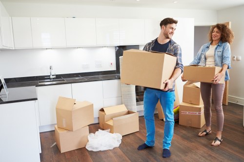 Loading furniture and boxes into a removals van in Hendon
