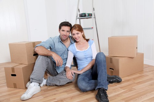 Professional movers handling furniture during a Hendon relocation