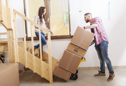 Professional movers planning a house relocation in Hendon