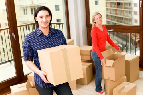 Business move preparation with labelled office crates in Hendon