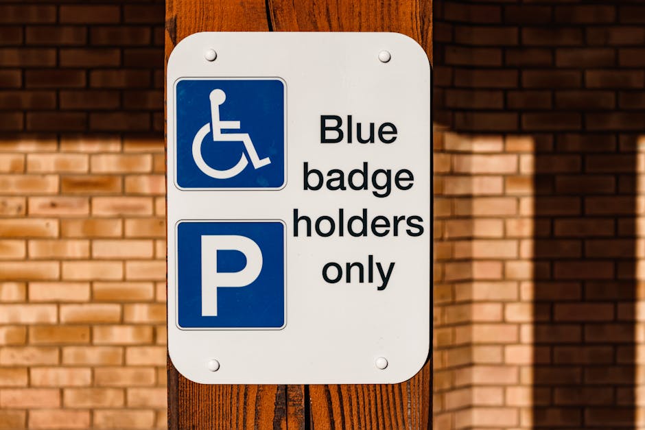 A green and white parking restriction sign mounted on a metal post displays a 2-hour parking limit from 8 am to 8 pm, excluding Sundays, with the notice issued by Los Angeles city authorities. The sign is positioned outdoors against a backdrop of partly cloudy blue sky and blurred green foliage, indicating an urban street environment. This type of parking regulation is relevant to planning home relocations or removals in Hendon, as it informs movers of parking restrictions that may affect loading and unloading at the property. Man with Van Hendon, a local removals company, considers such parking signs when organising furniture transport and moving logistics to ensure compliance with local rules and efficient loading processes during house moves, especially in areas with regulated parking hours.